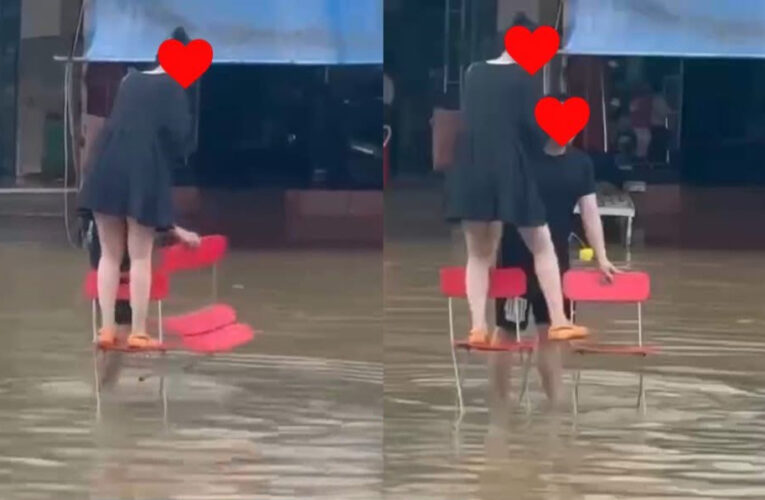 NHỨC ĐẦU: THƯƠNG VỢ ĐANG MANG THAI, ĐI LẠI KHÓ KHĂN, CHỒNG VỘI DÙNG GHẾ ĐỂ VỢ DI CHUYỂN QUA CHỖ NƯỚC NGẬP. NHƯNG NHỮNG LỜI BÌNH LUẬN TRONG VIDEO THÌ NÓ LẠ LẮM…